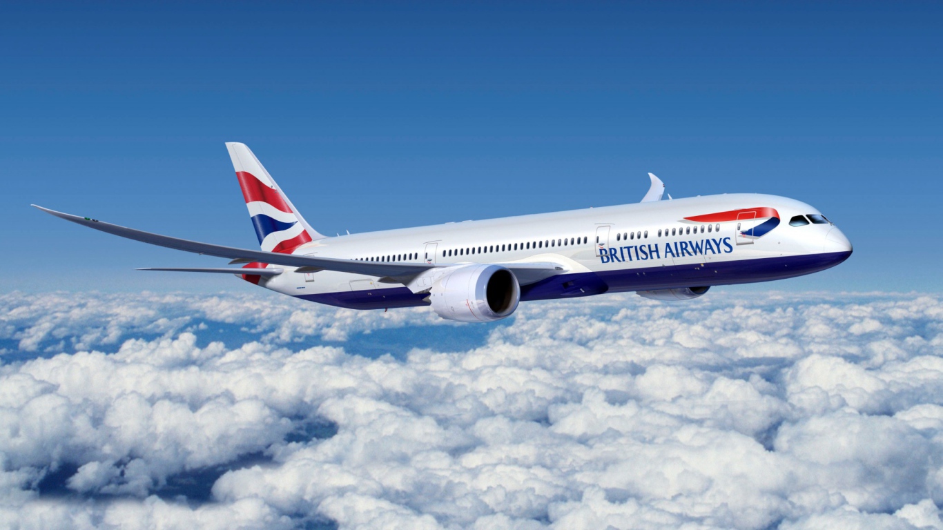 Самолет Boeing 777 авиакомпании British Airways летит над облаками 