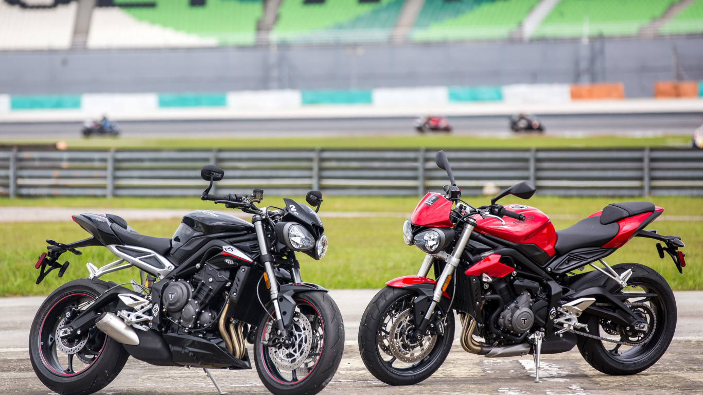 Черный и красный мотоциклы Triumph