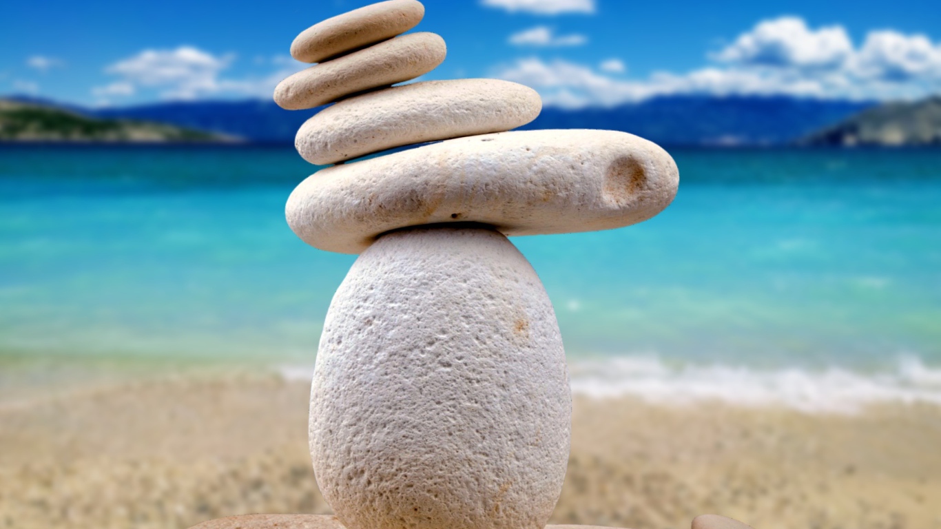 Балансирующие камни дзен на фоне океана