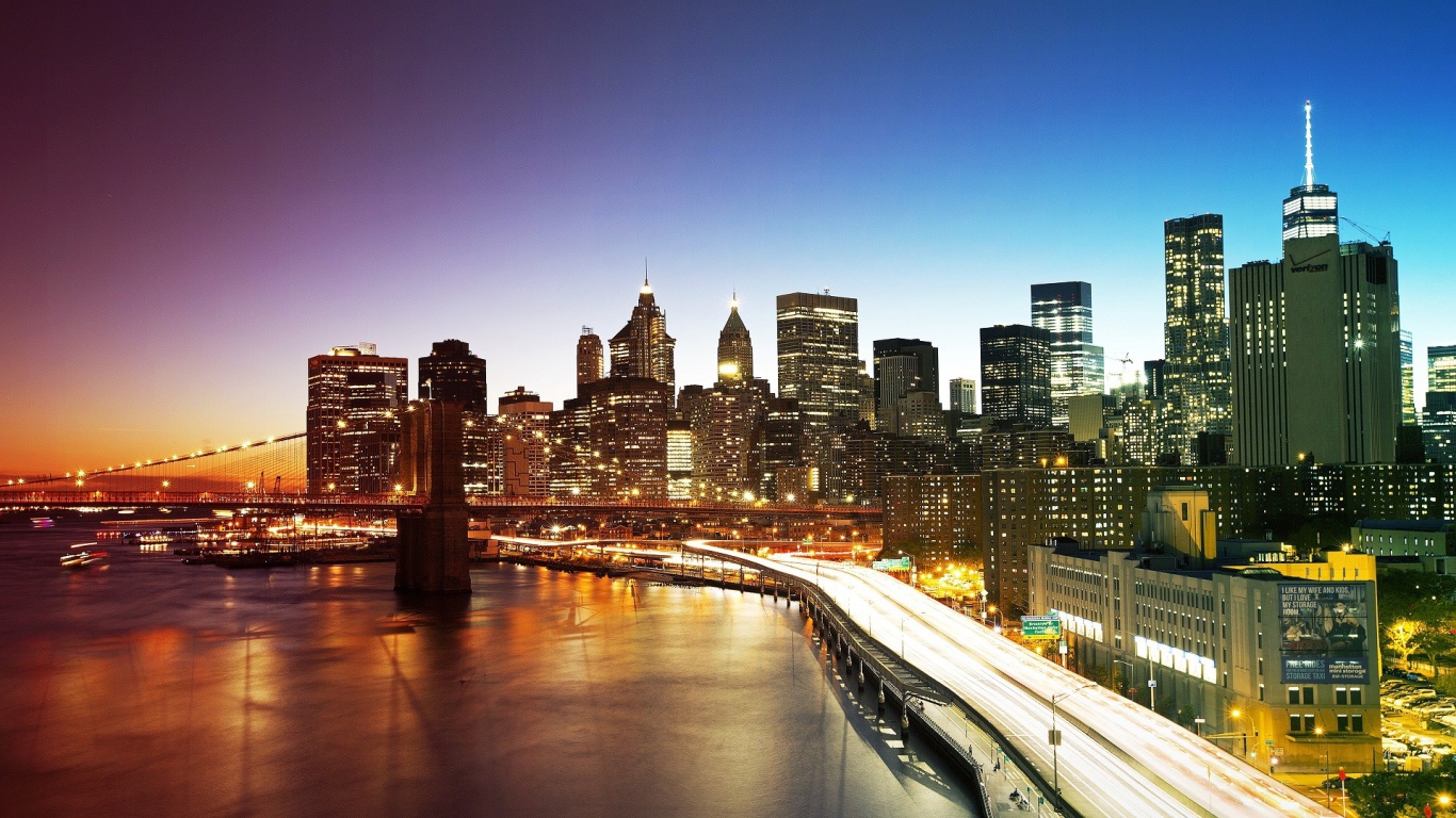 Brooklyn Bridge and the night lights of New York City