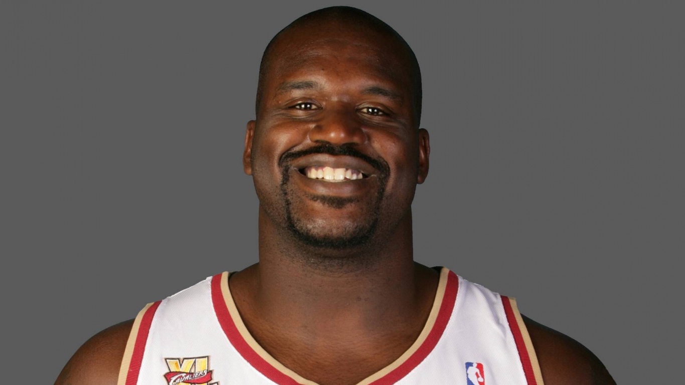 Basketball player Shaquille O'Neal smiles 