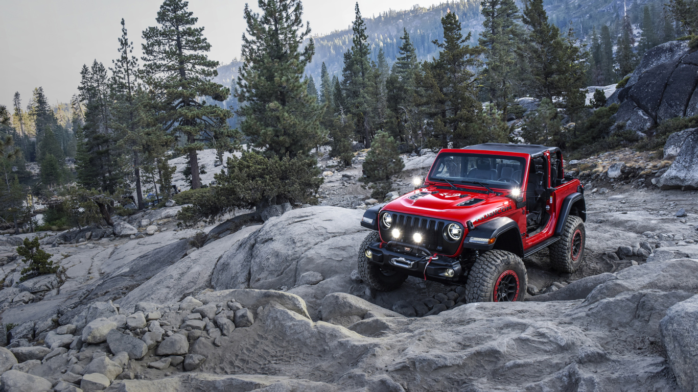 Красный внедорожник  Jeep Wrangler With Mopar, 2018 года в горах 