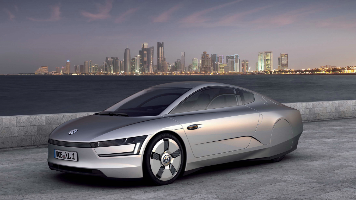 Автомобиль Volkswagen XL1 Concept,  2018 на фоне города