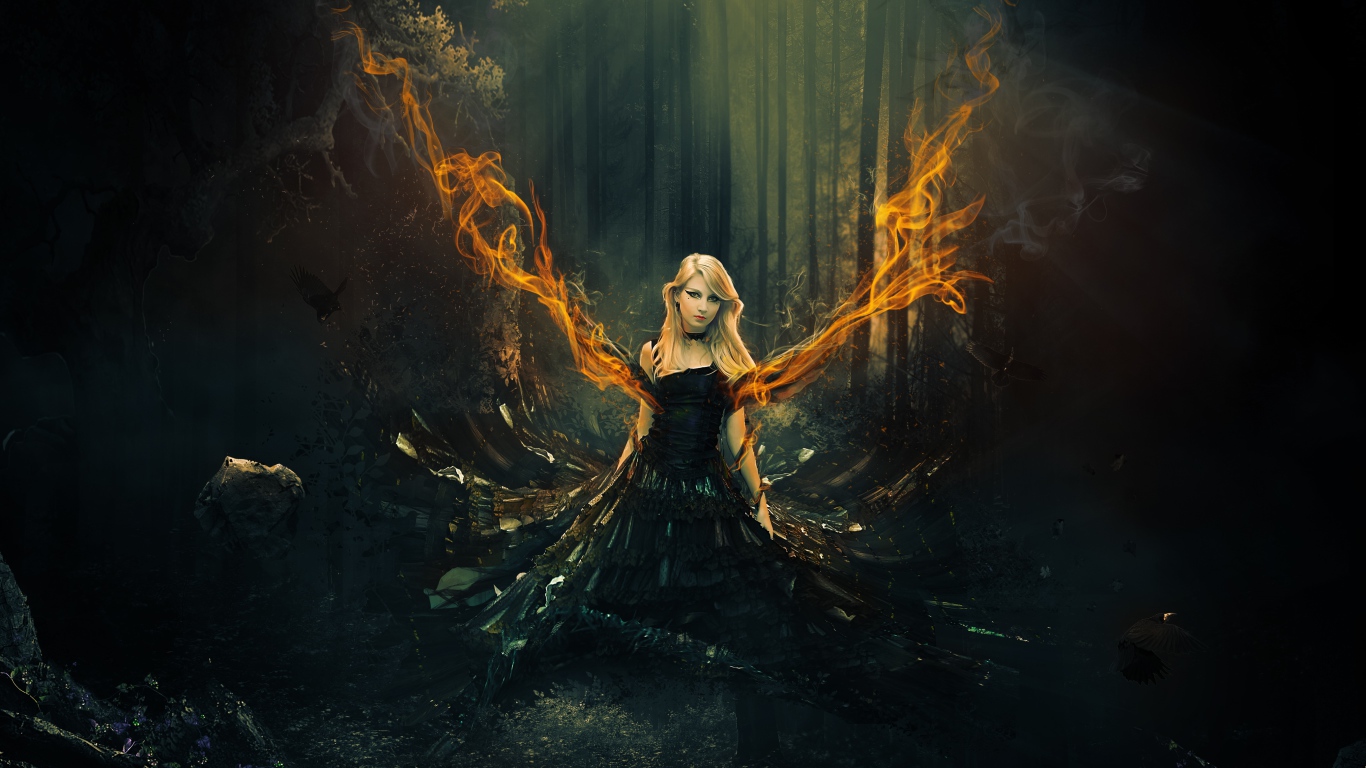 Фантастическая девушка в черном платье с огненными крыльями