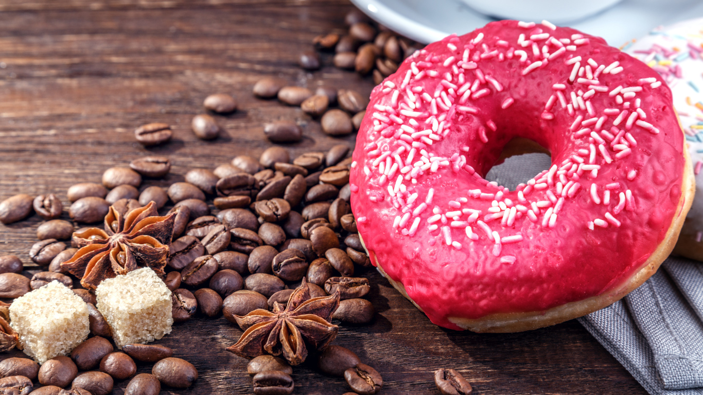 Пончик с глазурью, зернами кофе,  сахаром и бадьяном