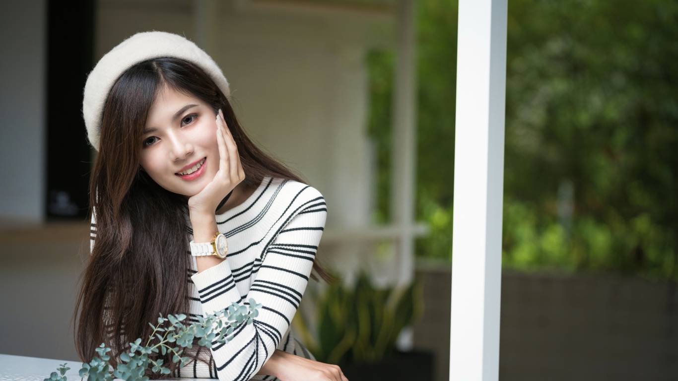 Beautiful asian girl in white beret