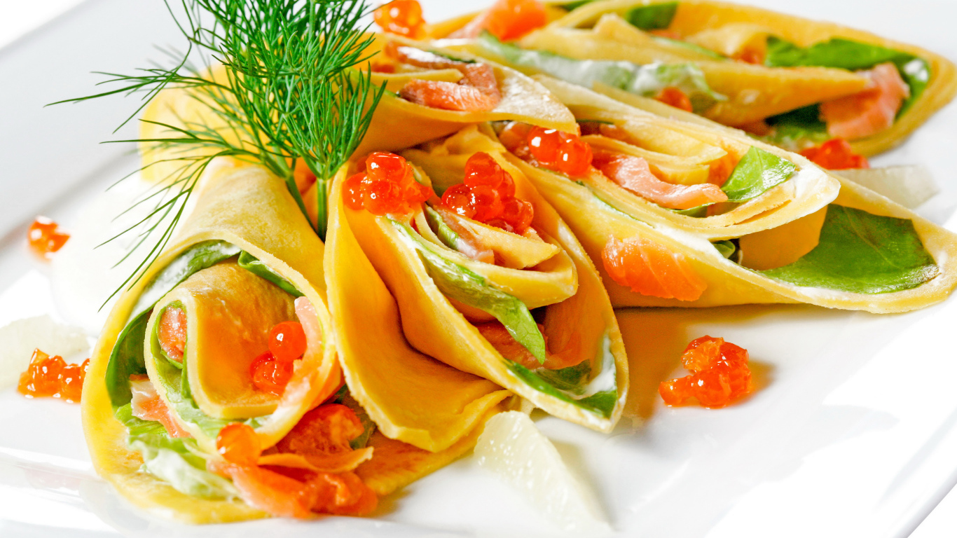 Рулетики из блинов с красной рыбой и красной икрой и зеленью на Масленицу