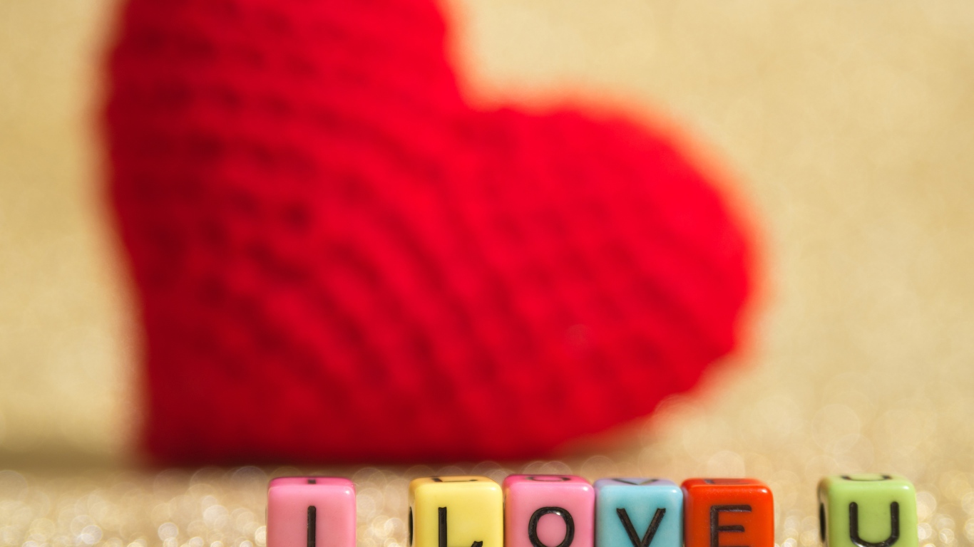 Кубики с буквами я тебя люблю на фоне красного сердца