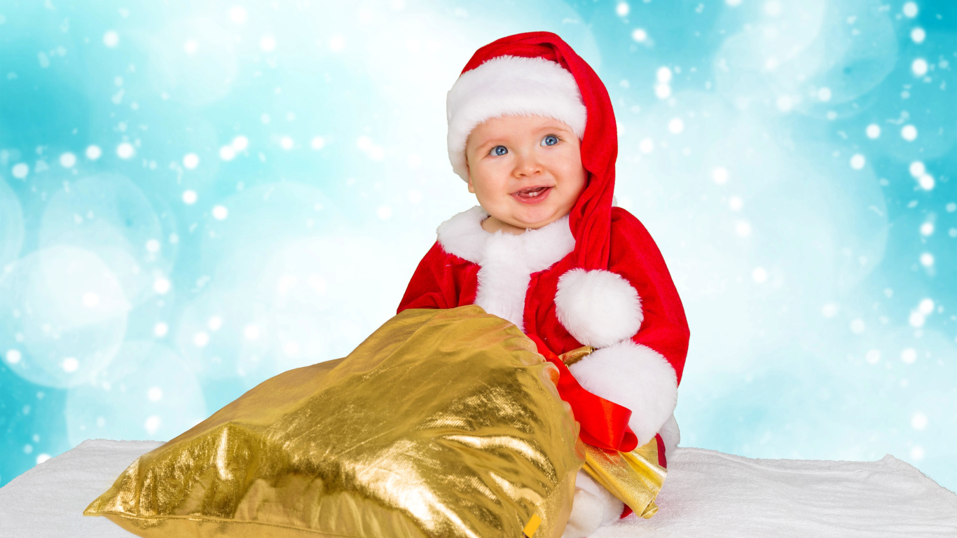 Улыбающийся ребенок в костюме Санта Клауса  с мешком 
