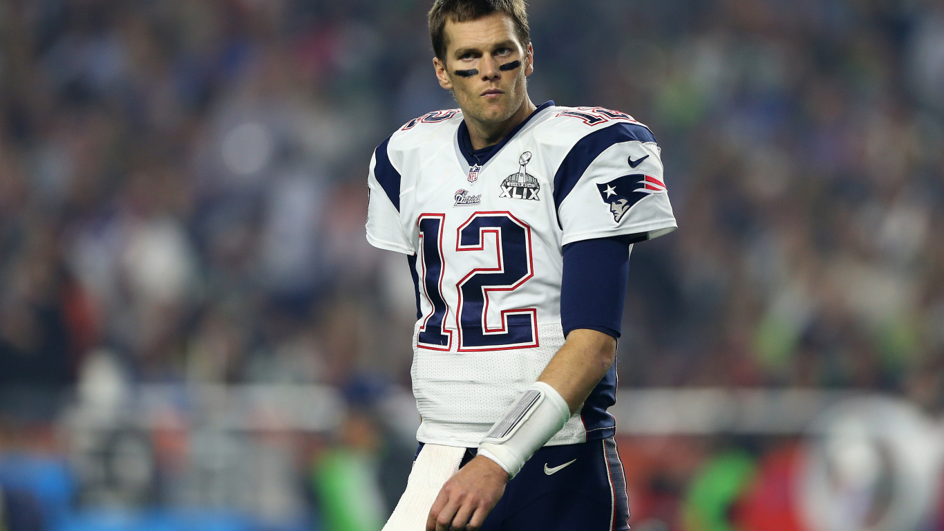 Игрок в американский футбол Том Брэди