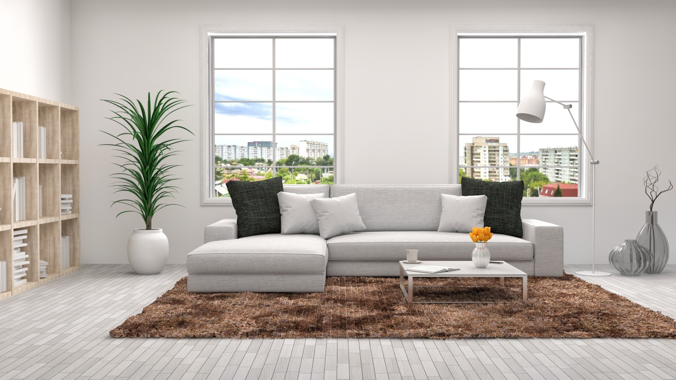 Гостиная комната с большим диваном и окнами в сером цвете 