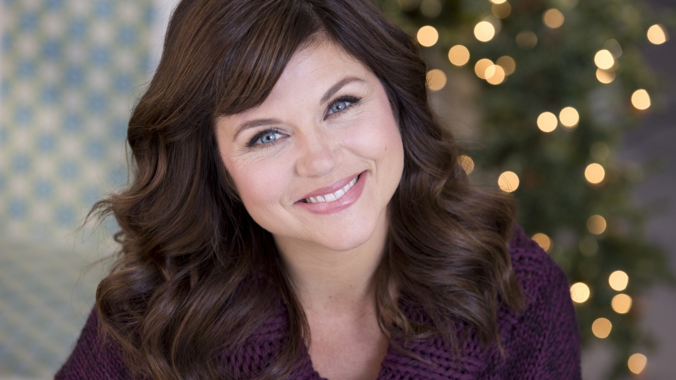 Милая голубоглазая улыбающаяся актриса Тиффани Тиссен