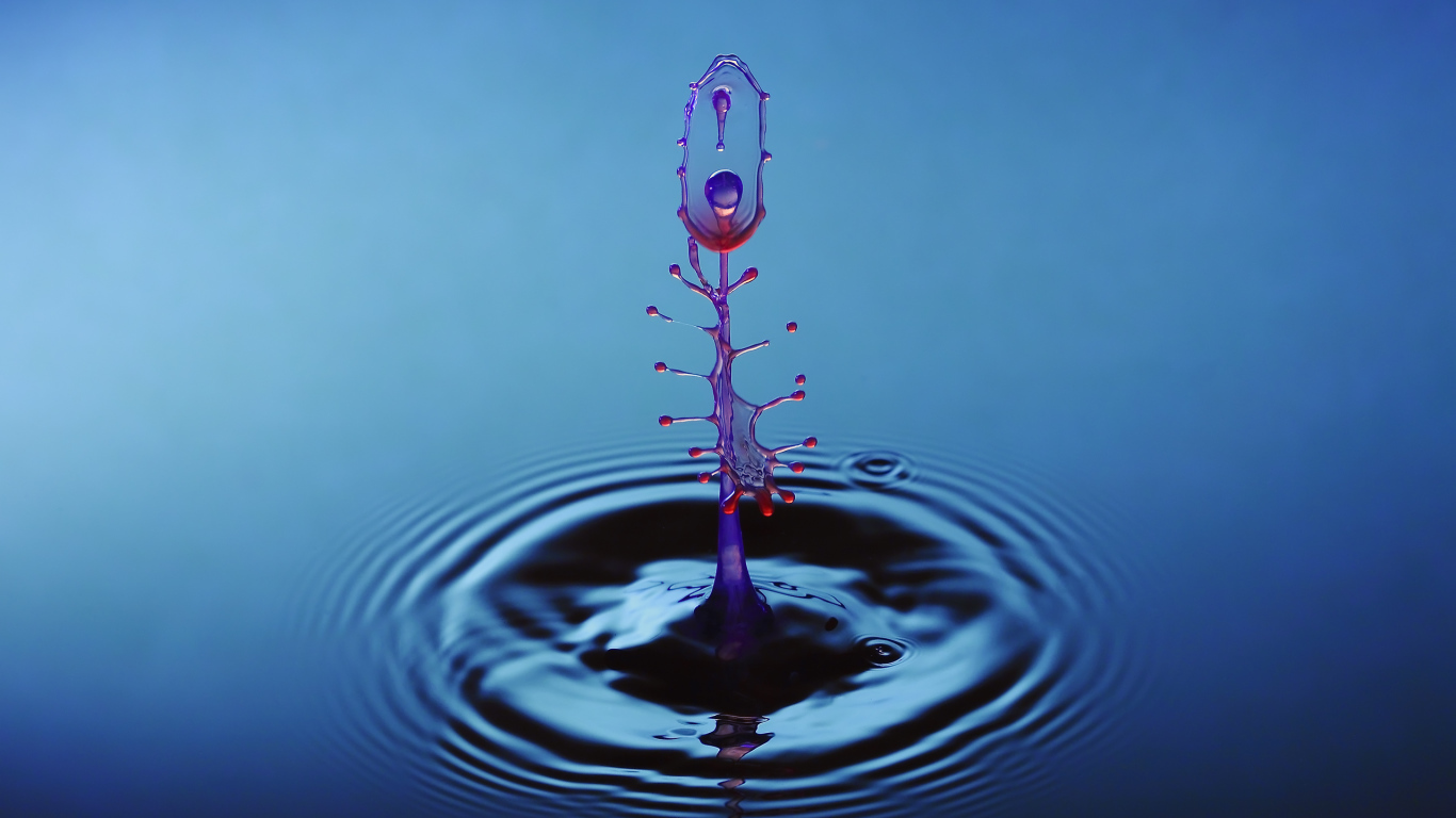 Брызги от капли воды на голубом фоне 3д графика