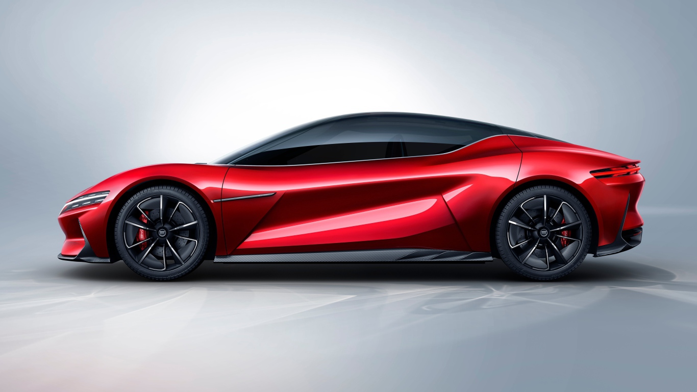 Красный автомобиль BYD E-SEED GT 2019 года на сером фоне