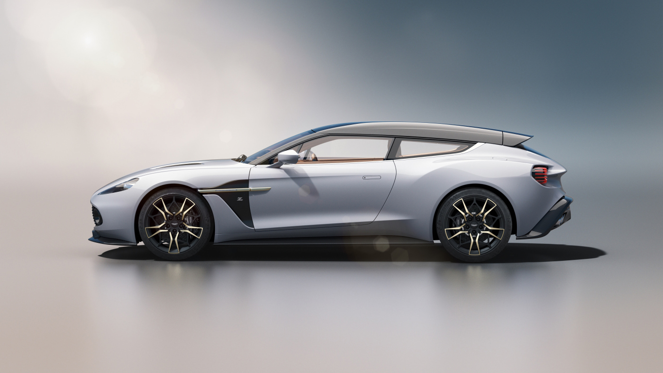 Серебристый автомобиль Aston Martin Vanquish 2019 вид сбоку