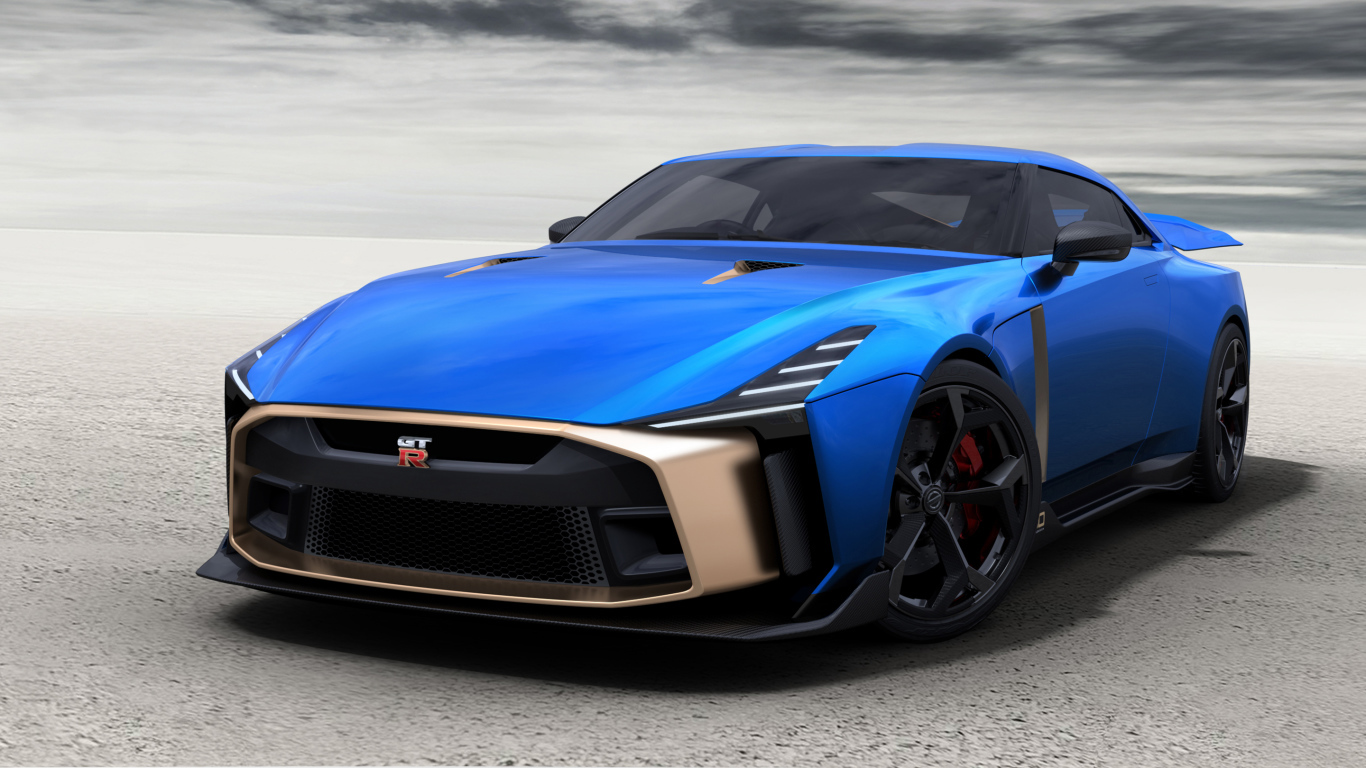 Синий автомобиль Nissan GT-R50 2019 года под грозовым небом