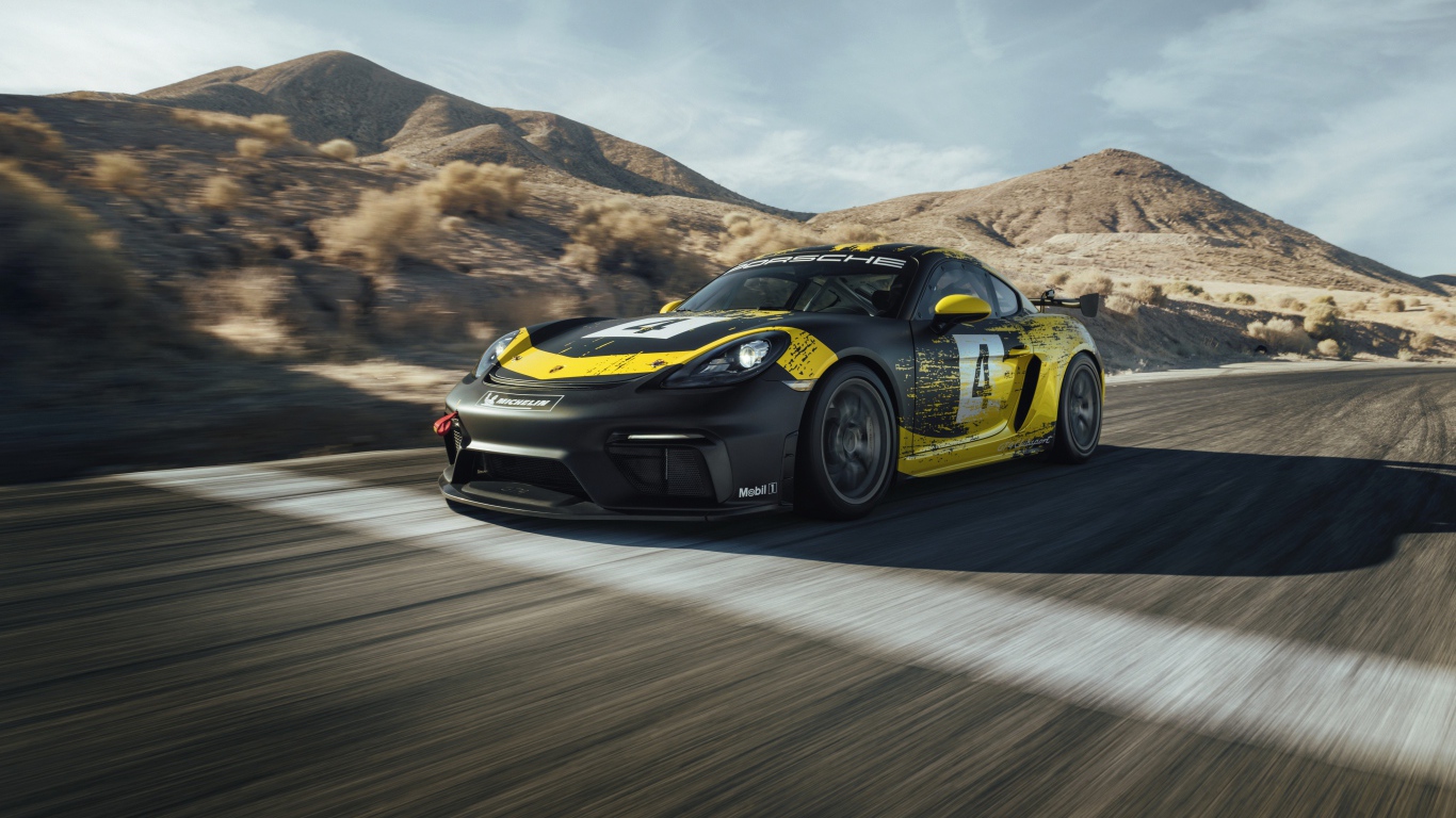 Спортивный автомобиль Porsche Cayman GT4 на трассе 