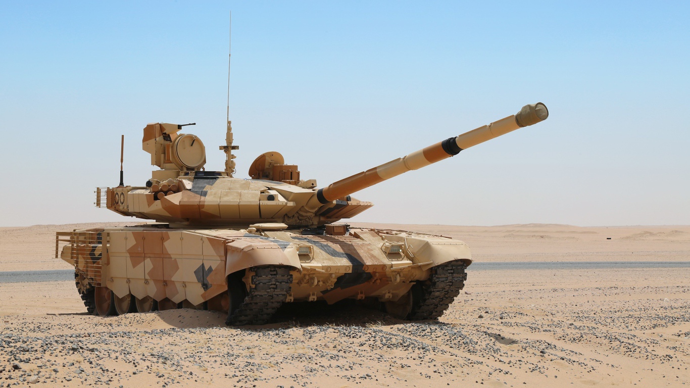 Tank T-90 in the desert against the blue sky