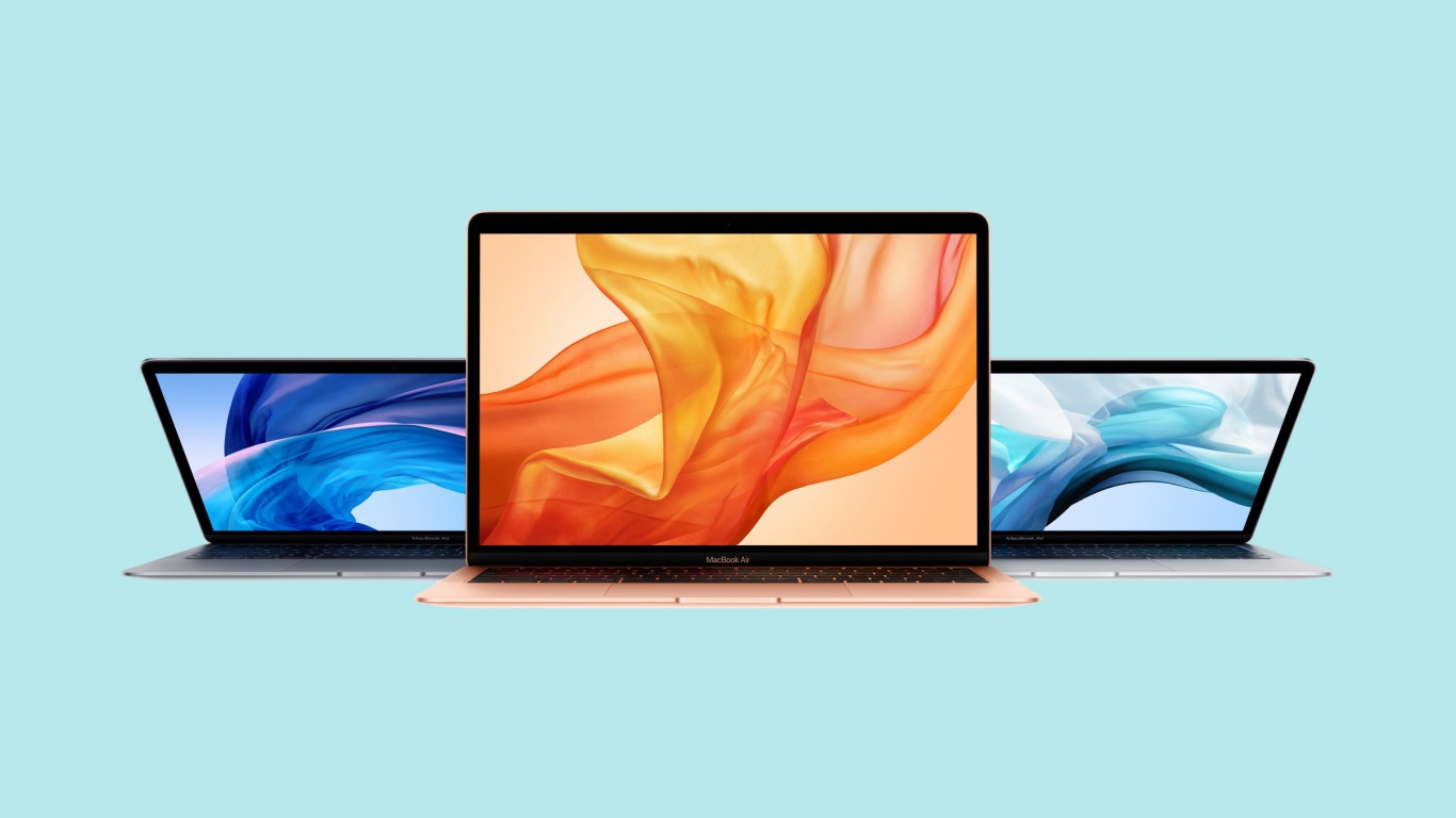 Тонкие макбуки MacBook Air на голубом фоне