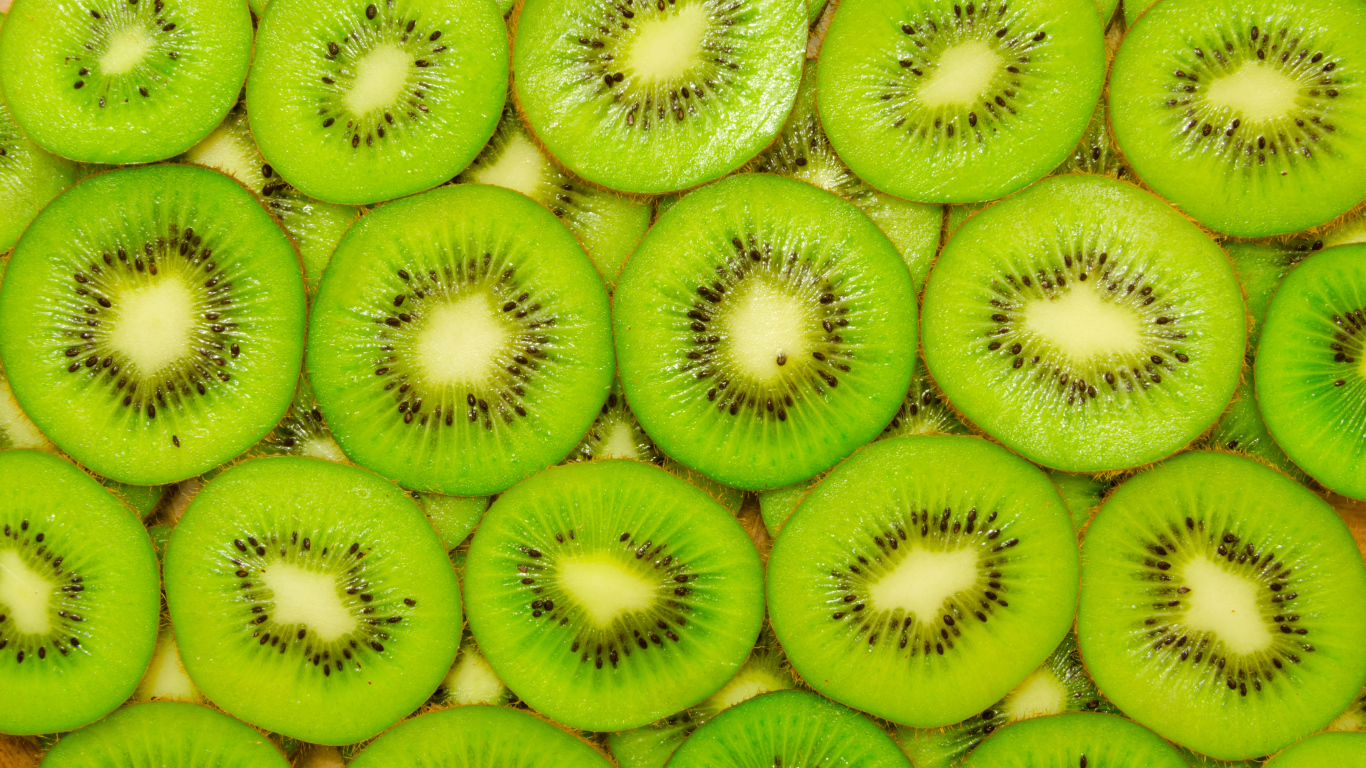 Фон из сочных кусочков киви крупным планом