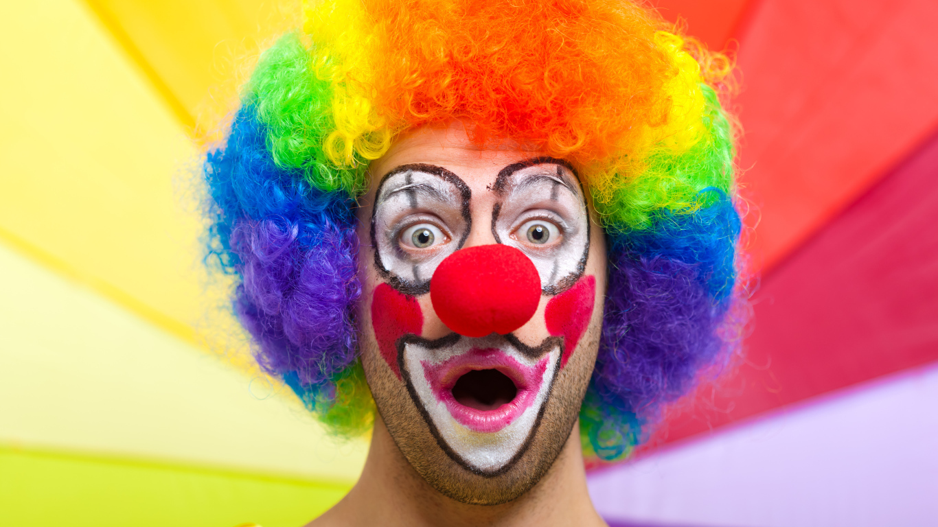 Surprised man in a clown costume