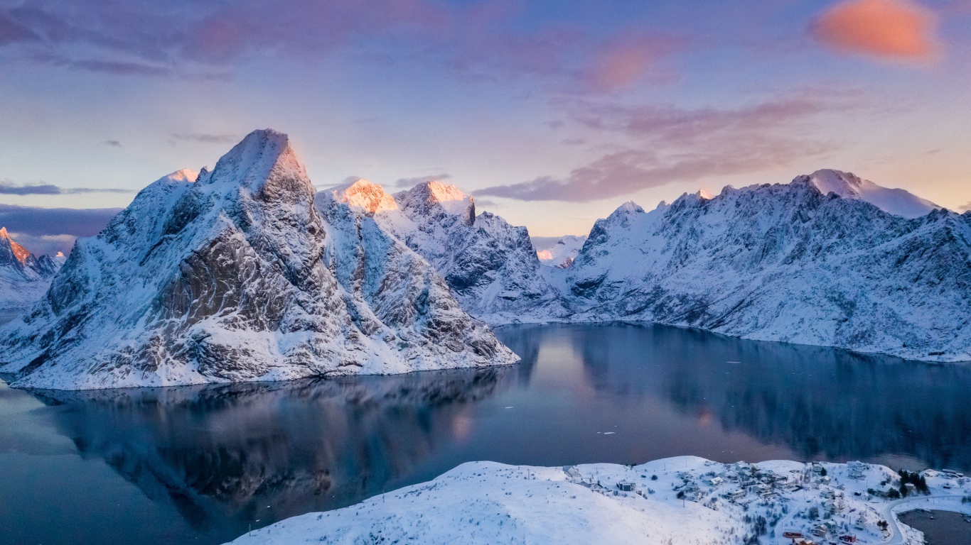 Ice-covered lake in the mountains, Lofoten islands. Norway