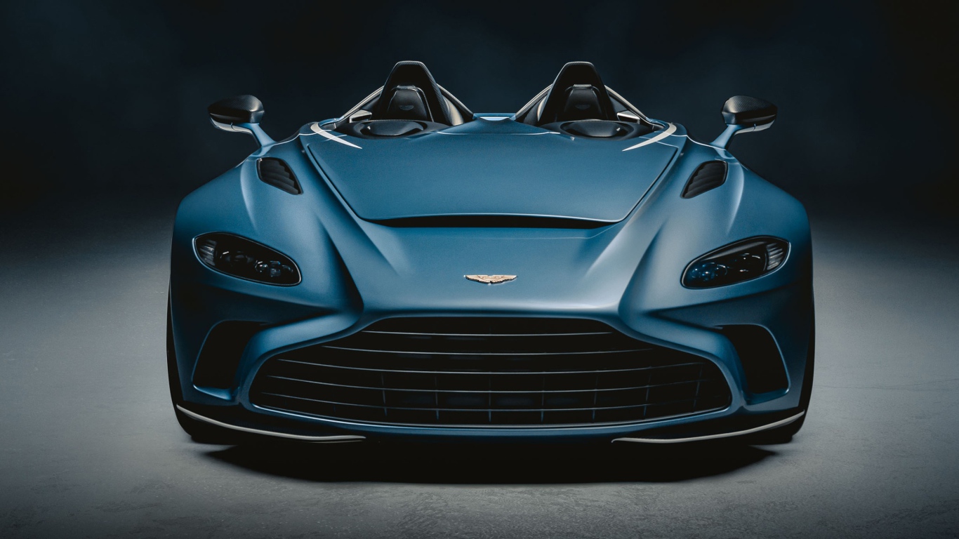 Автомобиль Aston Martin V12 Speedster 2020 года на сером фоне