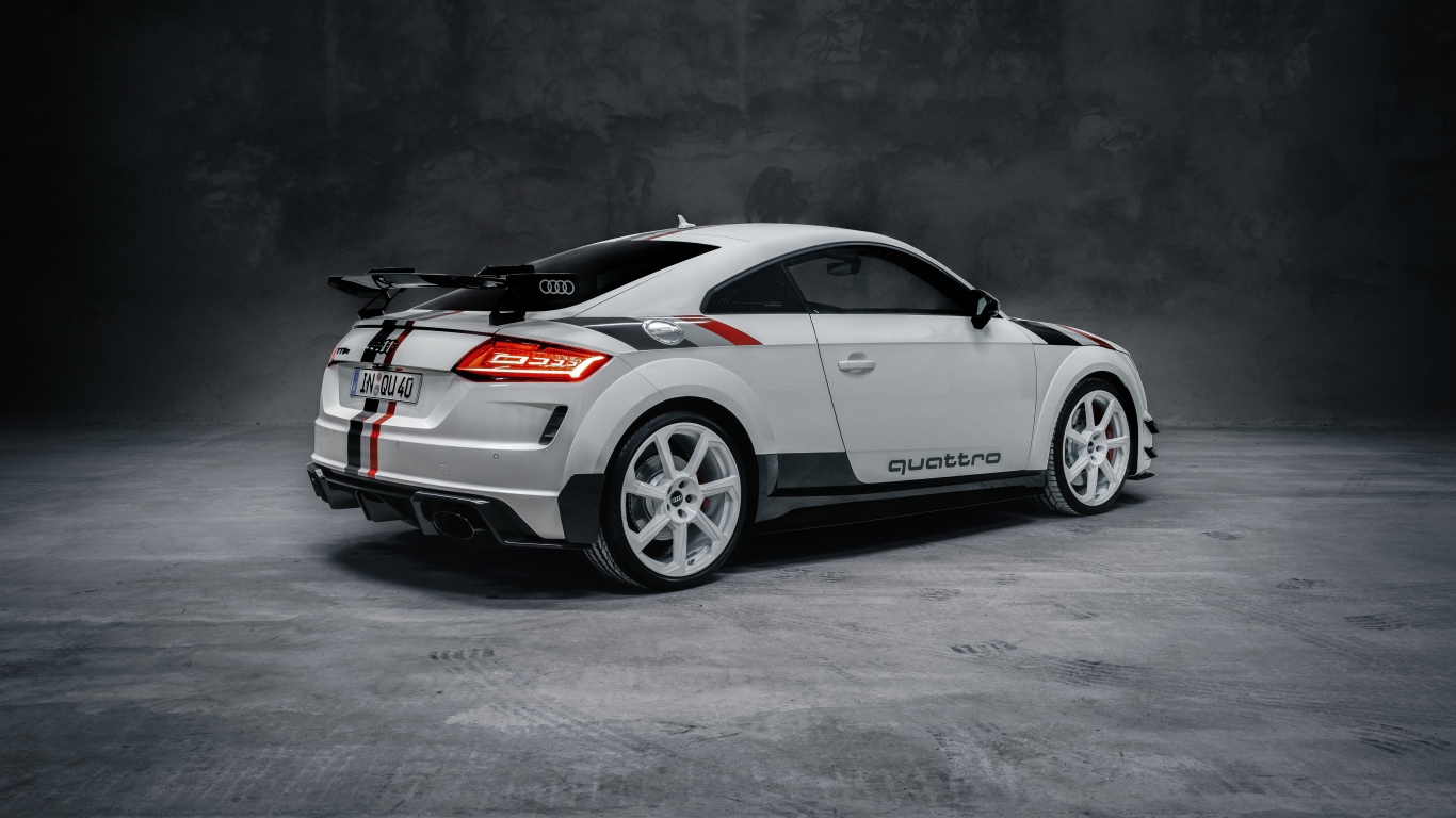 Спортивный автомобиль Audi TT RS Coupé 40 Jahre Quattro 2020 года на сером фоне