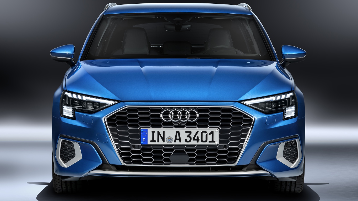 Синий автомобиль Audi A3 Sportback 35 TFSI 2020 года на сером фоне