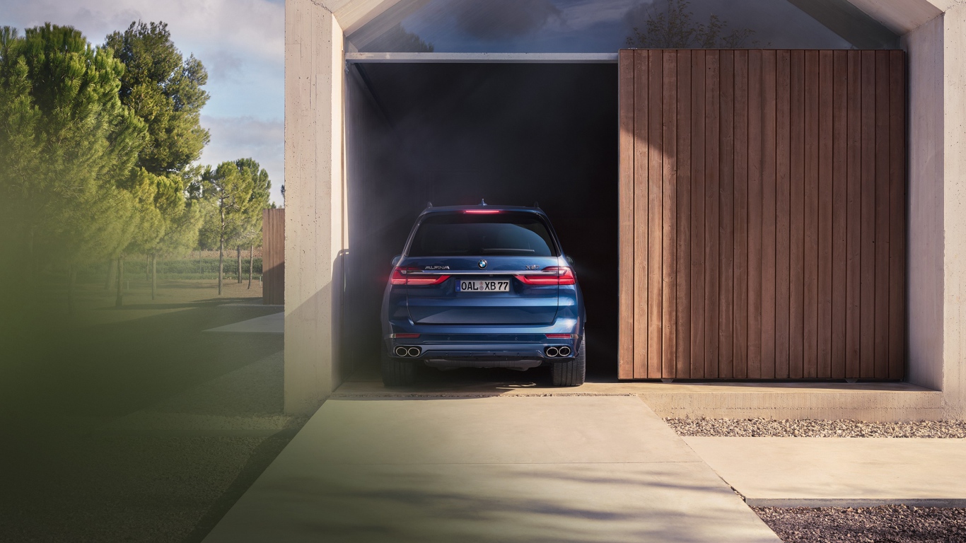 Blue BMW Alpina XB7 SUV, 2021 in the garage