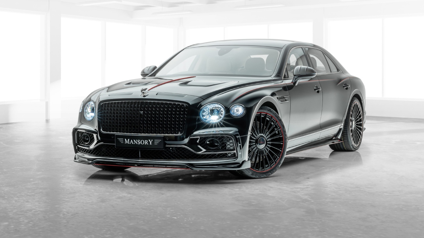 Черный автомобиль Mansory Bentley Flying Spur 2020 года на белом фоне