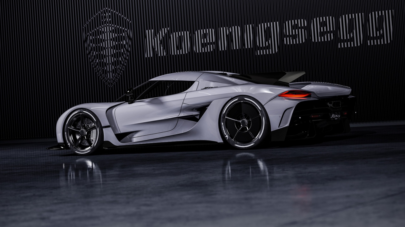 Автомобиль Koenigsegg Jesko Absolut 2020 года на фоне логотипа