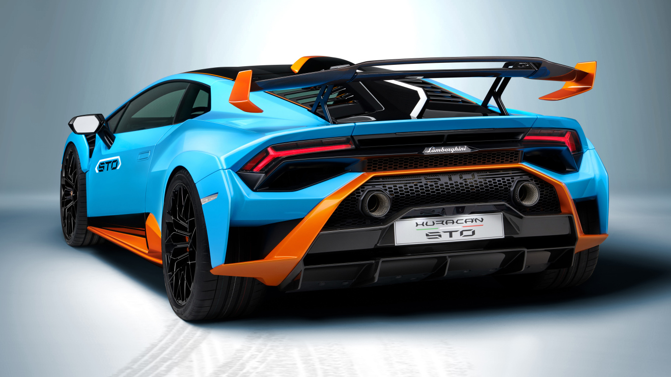 Автомобиль Lamborghini Huracán STO 2021 года вид сзади на сером фоне