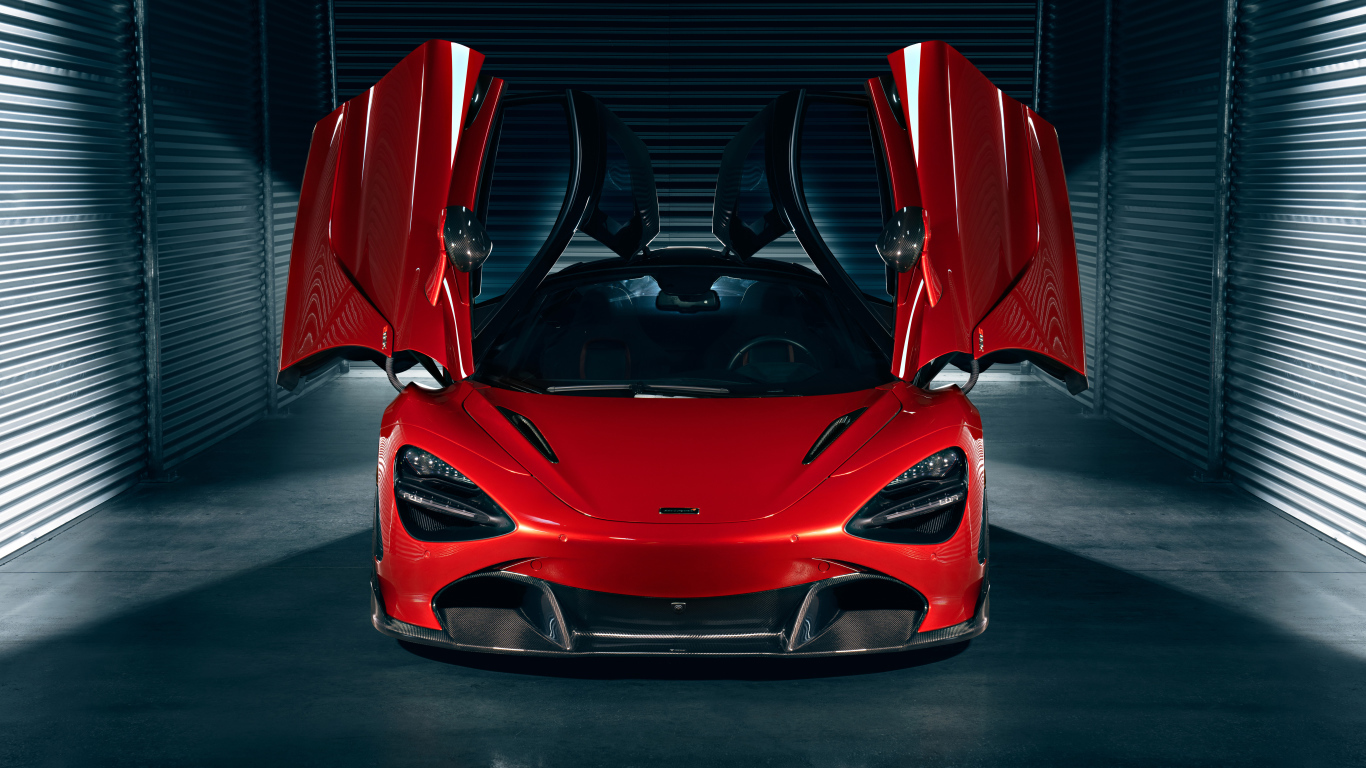 Красный автомобиль McLaren 720S с открытыми дверями в гараже