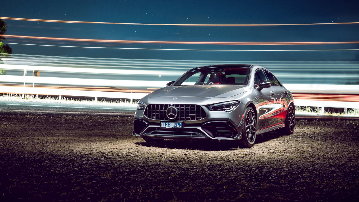 Серебристый автомобиль Mercedes-AMG CLA 45 S 4MATIC, 2020 года у трассы 