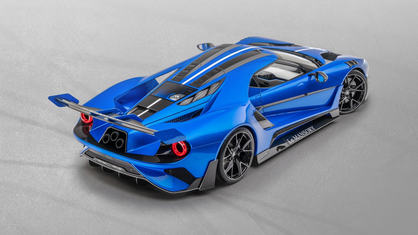 Синий автомобиль Mansory La MANSORY 2020 года на сером фоне вид сзади