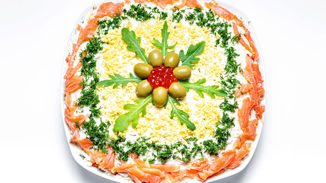 Вкусный салат с красной рыбой на белом фоне