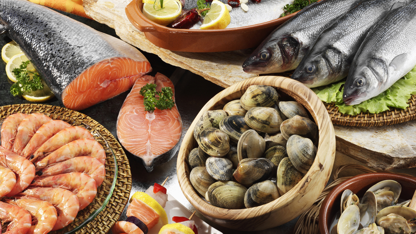 Mussels, prawns and fresh fish on the table