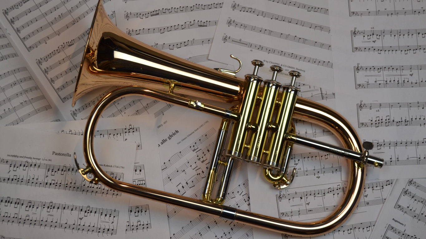 Musical instrument trumpet lies on notes