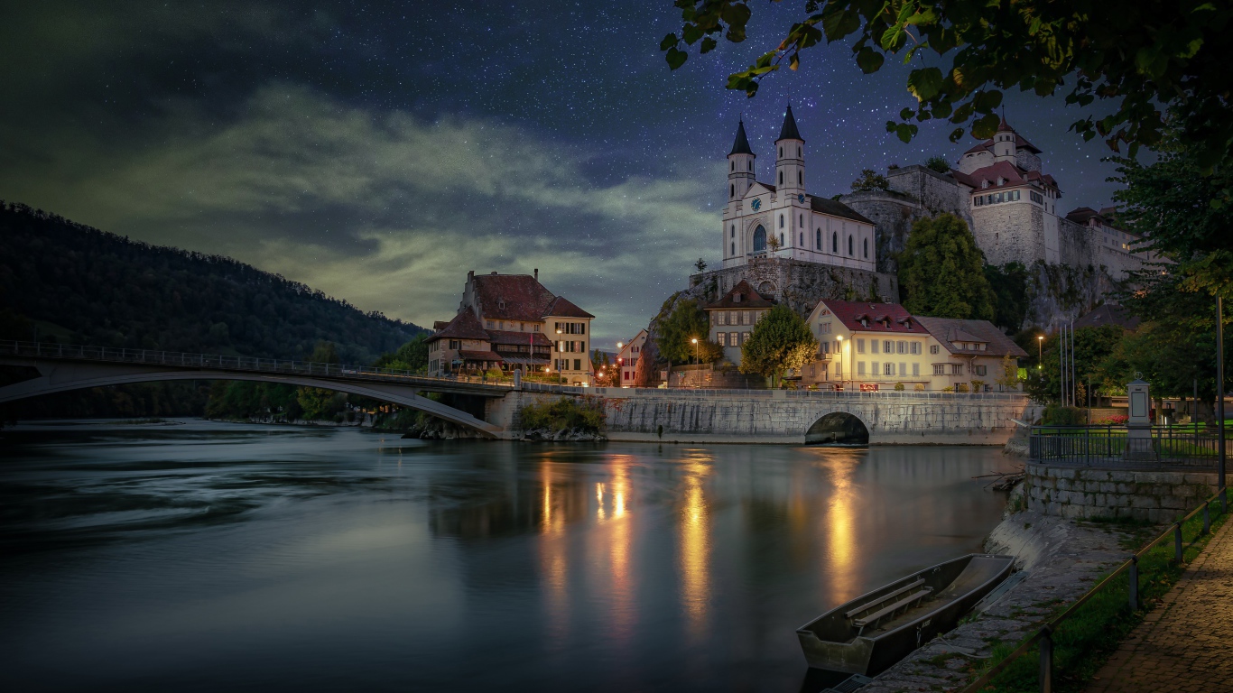 Beautiful view of the Aarburg castle at night under a beautiful starry sky, Switzerland