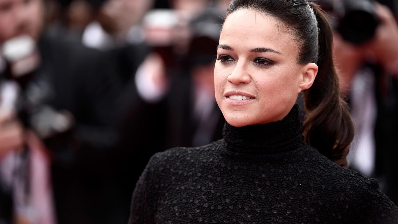 Actress Michelle Rodriguez in a black sweater