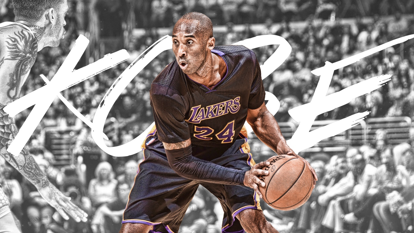 Basketball player Kobe Bryant with the ball on the field