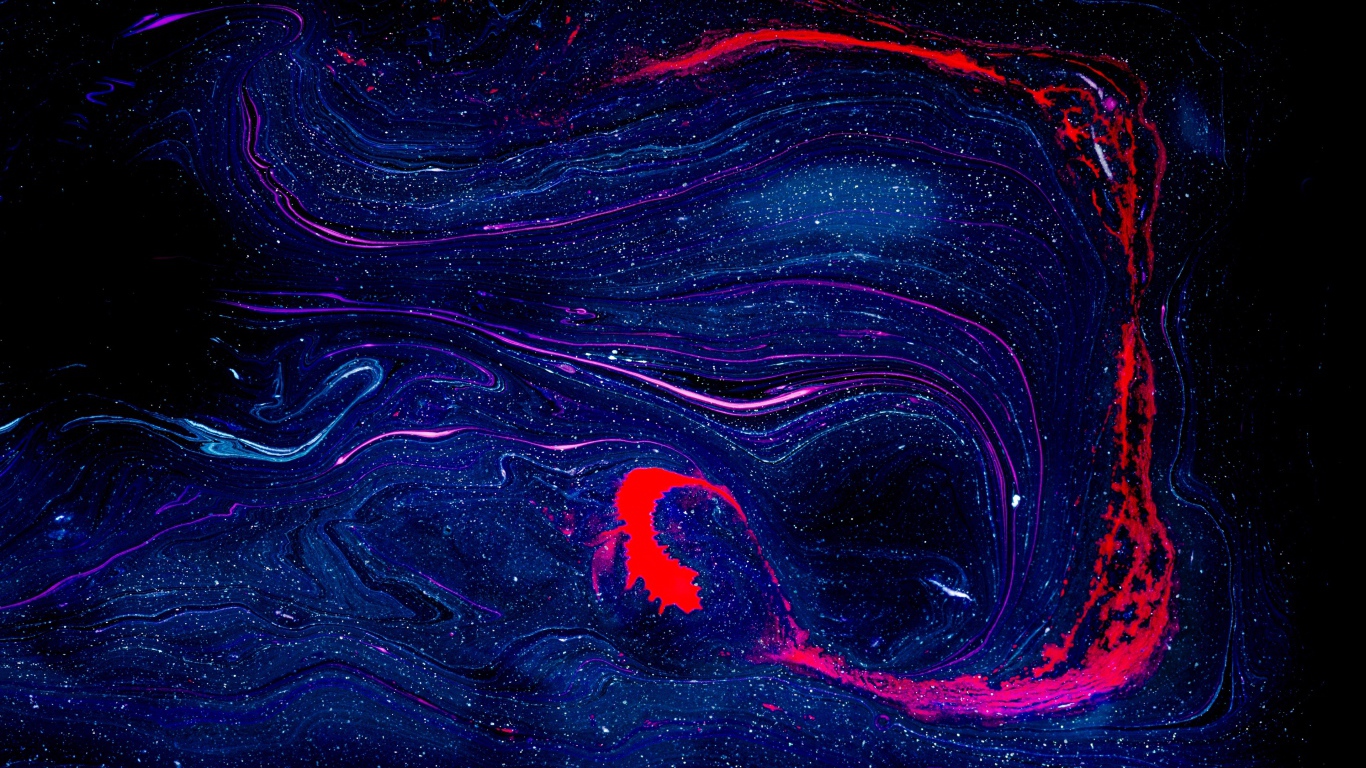 Размытое пятно синей и красной краски на черном фоне