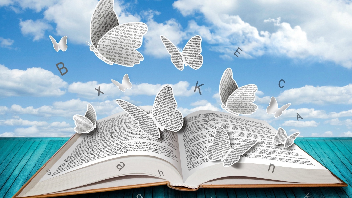 Бумажные бабочки и буквы над книгой 