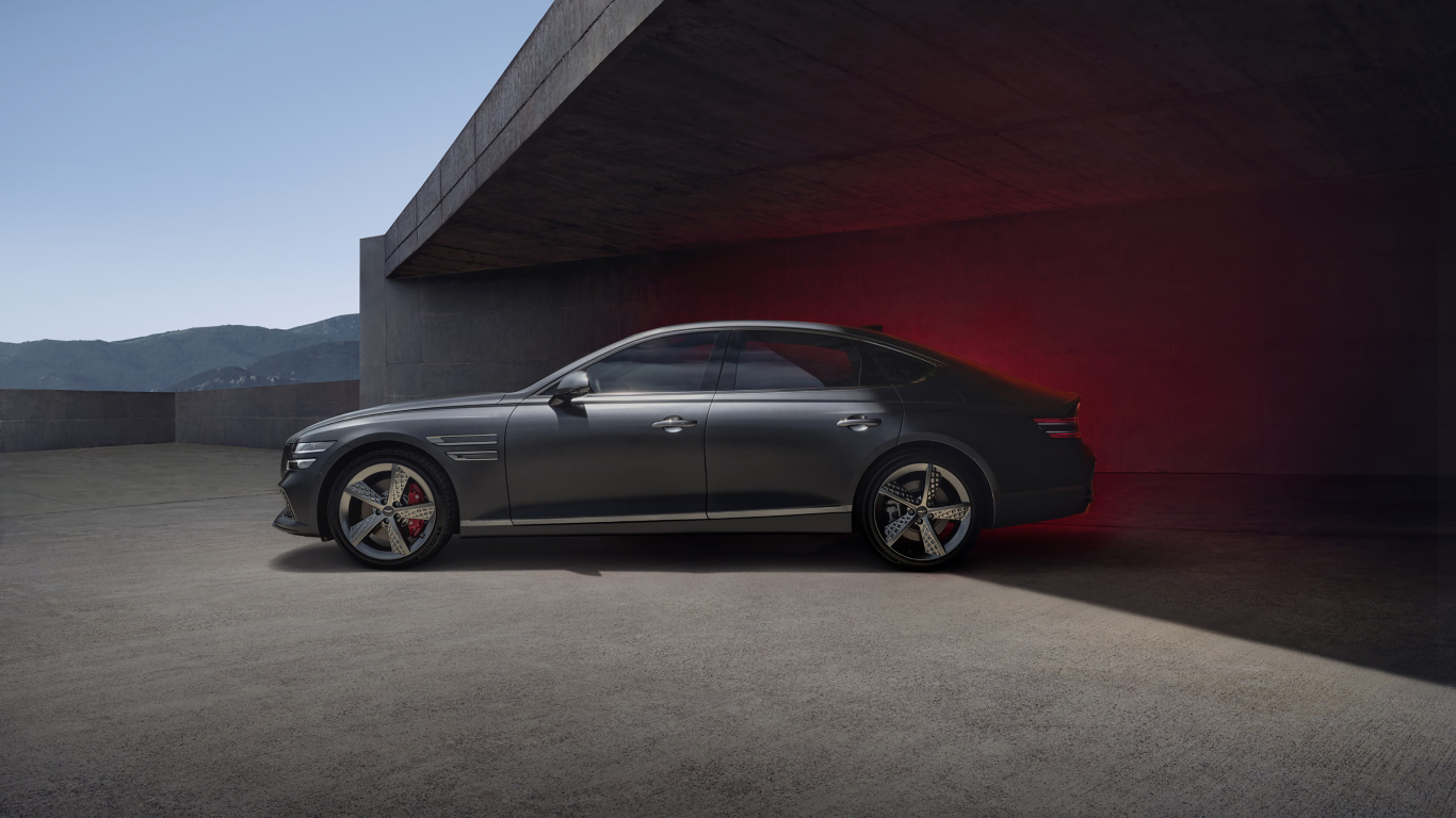 Вид сбоку на автомобиль Genesis G80 Sport 2021 года