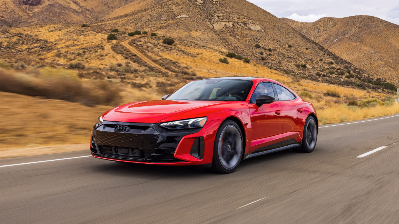 Красный Audi RS E-Tron GT, 2022 года на трассе в горах