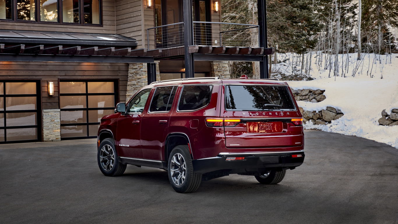 Красный внедорожник Jeep Wagoneer Series II Premium, 2022 года вид сзади