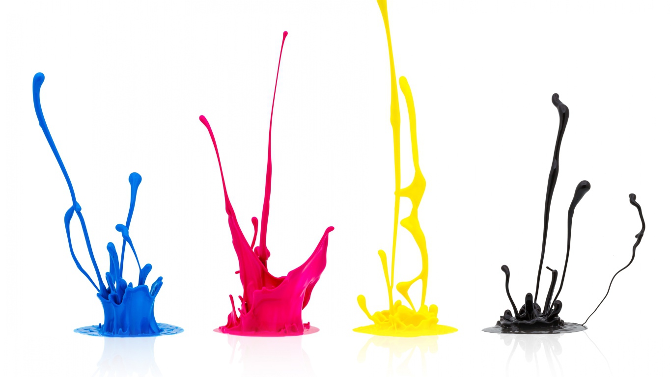 Брызги разноцветной краски на белом фоне