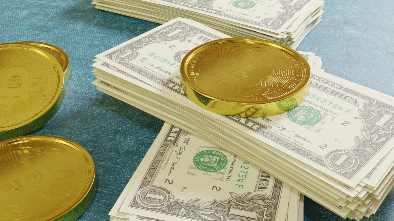 Доллары с золотой монетой биткоин 