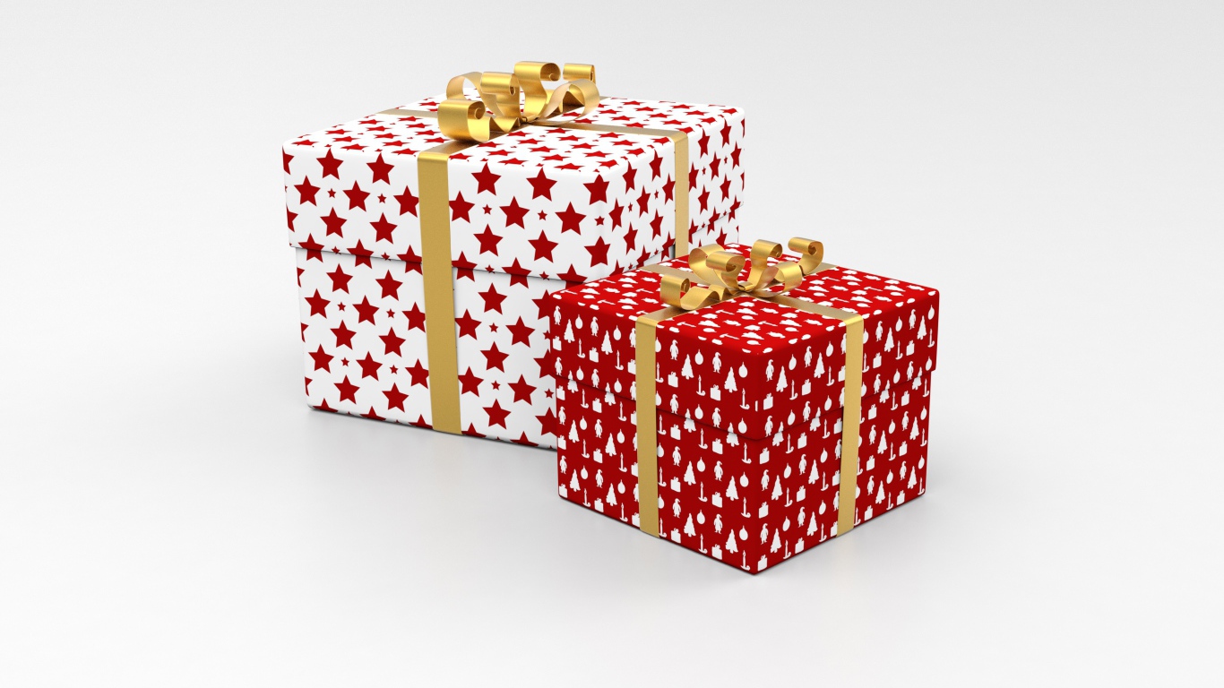 Две яркие коробки с подарками на сером фоне